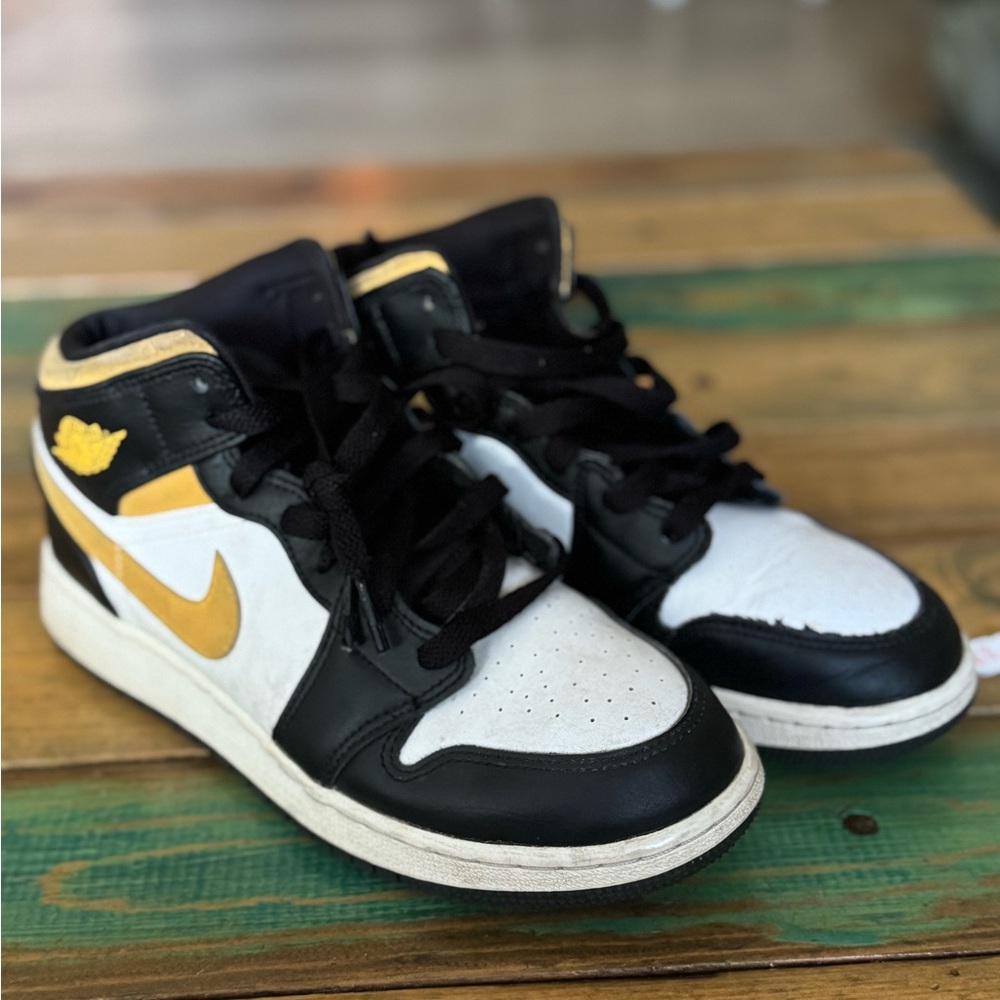 Black and White Sneakers with Gold Accents